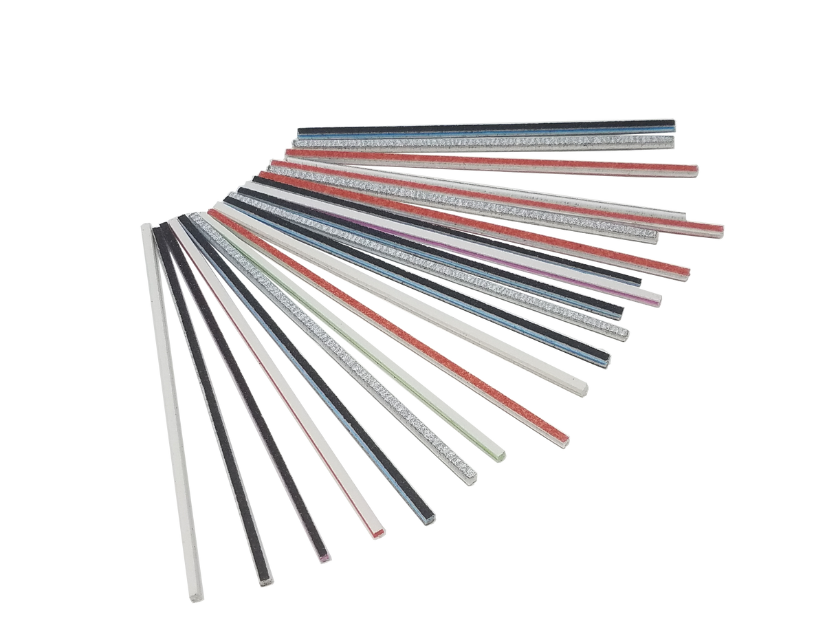 Durasand Sanding Twigs fanned out, showing all grit colors